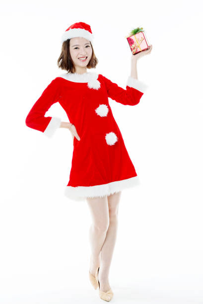 istock Santa girl with christmas gift box 650642182