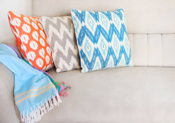 istock Cozy living room with pillows on boho style sofa 650655640