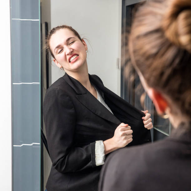 istock angry smart young woman losing temper in front of mirror 650662196