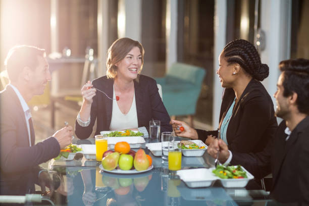 Group of businesspeople having breakfast