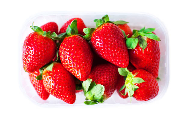 istock Fresh Strawberries in a box isolated on white  background close up 650677988