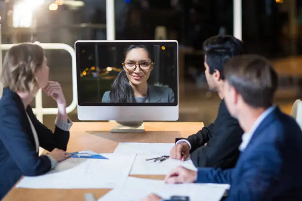 Photo of Business team having vide conference