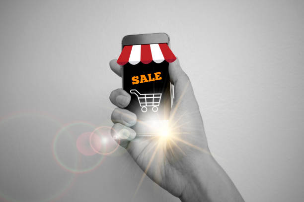 istock shopping cart with application software icons on mobile 650684376