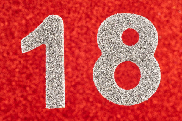 istock Number eighteen silver color over a red background. Anniversary. 650689248