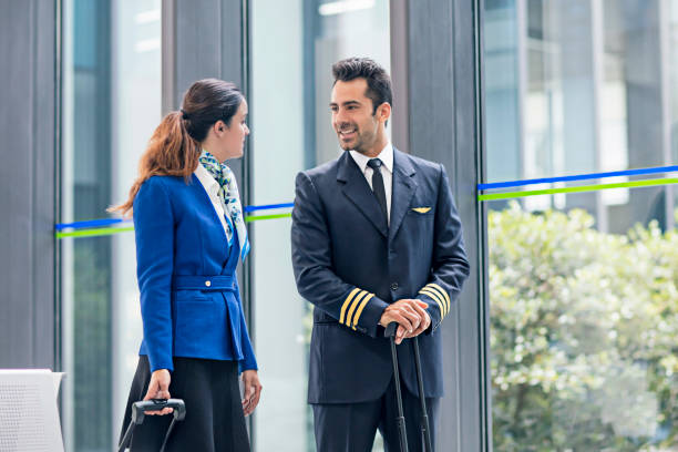 istock Pilot communicating with stewardess in airport 650689770