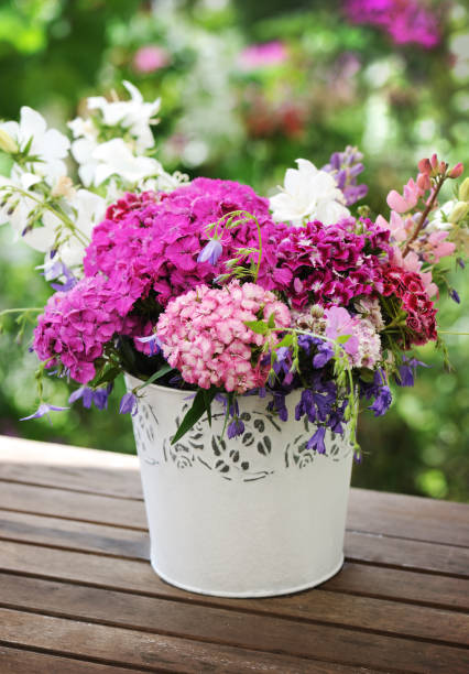 istock basket with beautiful flowers 650696408