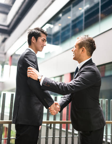 business meeting in japan - respect japan business togetherness imagens e fotografias de stock