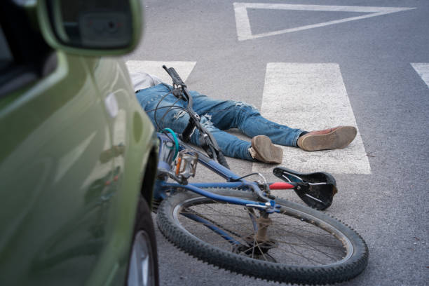 Bicycle accident Bicycle accident , man hit by a car pedestrian stock pictures, royalty-free photos & images
