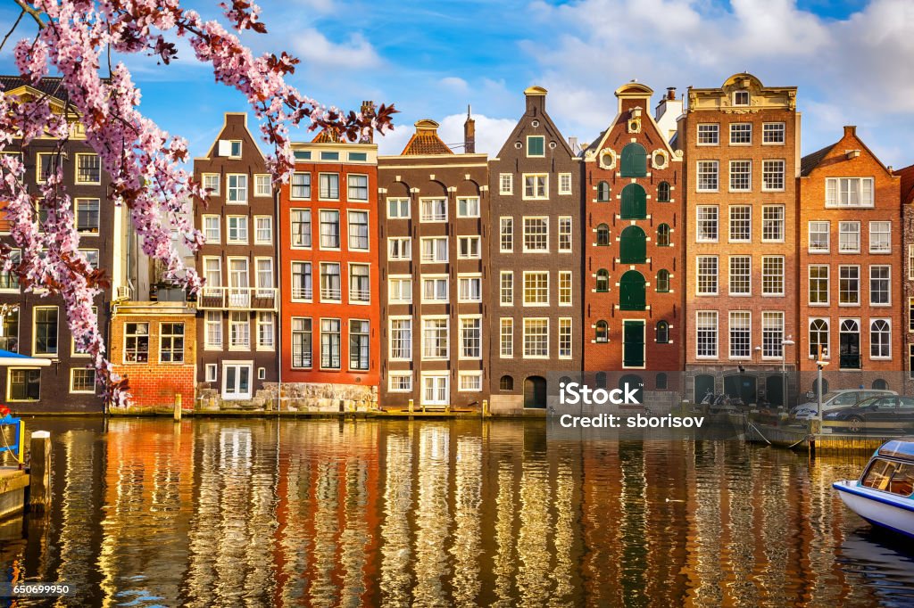 Old buildings in Amsterdam at spring Traditional old buildings in Amsterdam at spring, the Netherlands Amsterdam Stock Photo