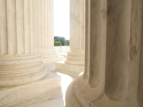 istock White Marble Columns at US Supreme Court Building in Washington DC 650703558