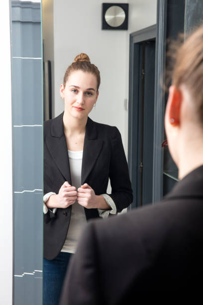 istock successful beautiful young woman with winning body language standing 650706796