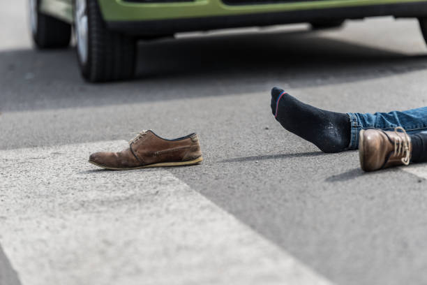 istock Traffic accident.Young man hit by a car 650707538