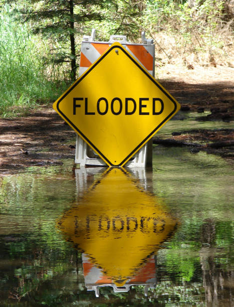 istock A sign that warns of flooding 650707910
