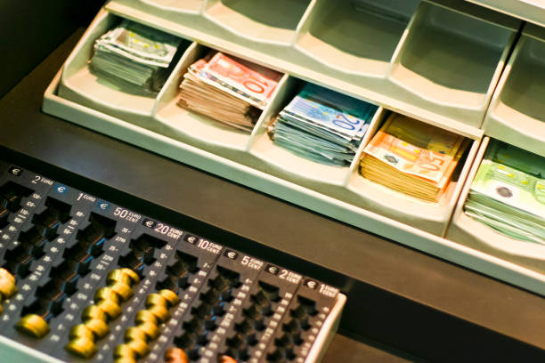 Sterilizing cash register with alcohol