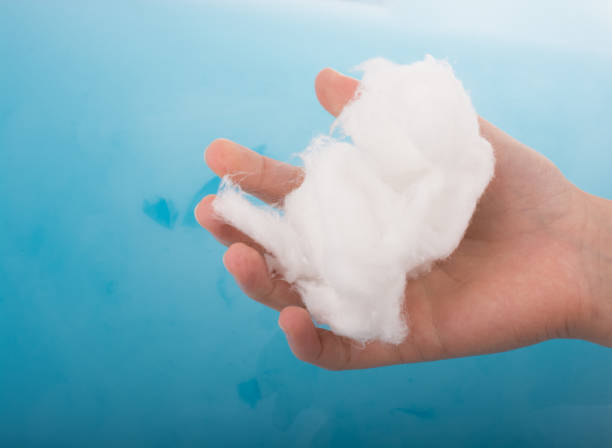 istock Hand holding some cotton in hand 650719032
