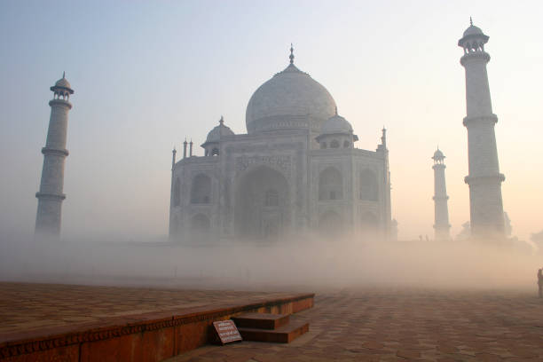 istock Temple Taj Mahal befogged, India 650720104