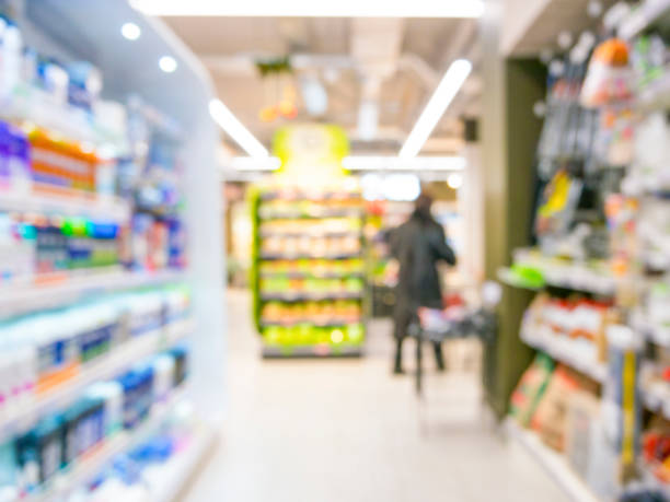 istock Abstract blurred supermarket aisle with colorful shelves 650742608