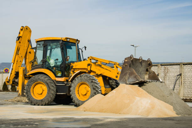 istock Excavator in the town 650768272
