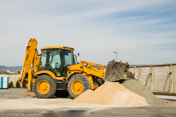 istock Excavator in the town 650768524