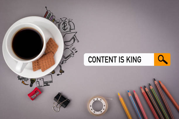 istock content is king concept. Gray office desk with the inscription 650775428