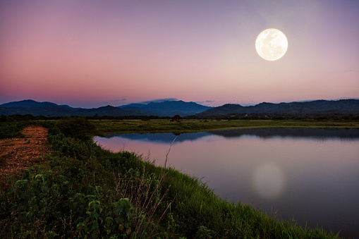 Moon light reflection over a country lagoon