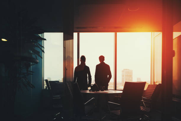 istock Group of business people near window 650856288