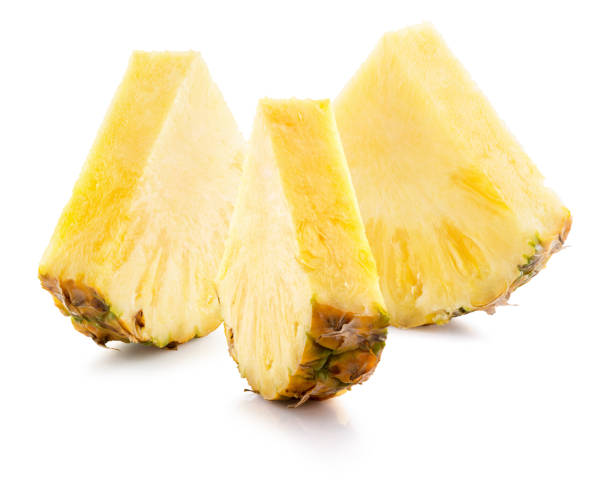 istock pineapple slices isolated on the white background 650860660