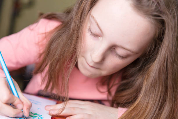 istock Little girl drawing 650913718