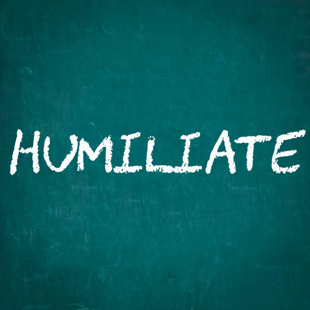 istock HUMILIATE written on chalkboard 650934710