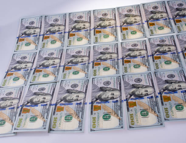 istock American 100 dollar banknotes placed on white background 650972098