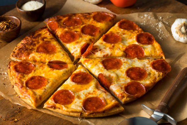 istock Cheap Greasy Frozen Pepperoni Pizza 650984242