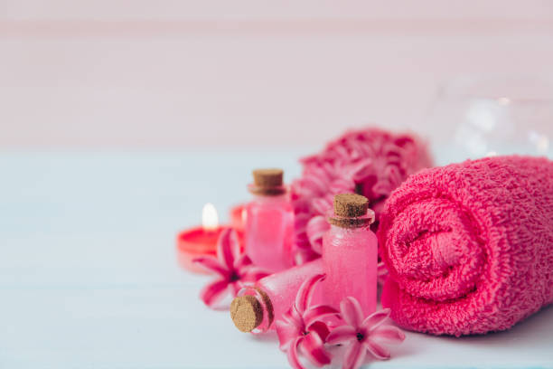 istock Composition of spa treatment on the white wooden table 650986316