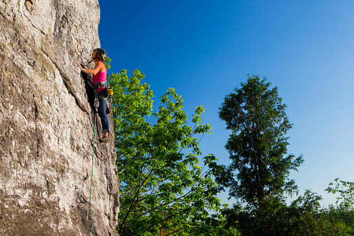 Woman Rock Climbing On Ontarios Niagara Escarpment In Canada Stock
