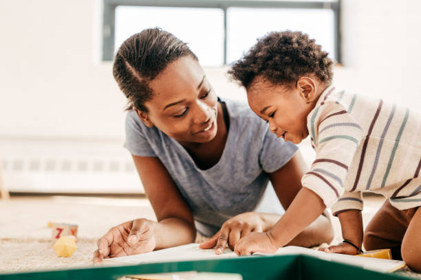 istock Mom reading for toddler 651005508