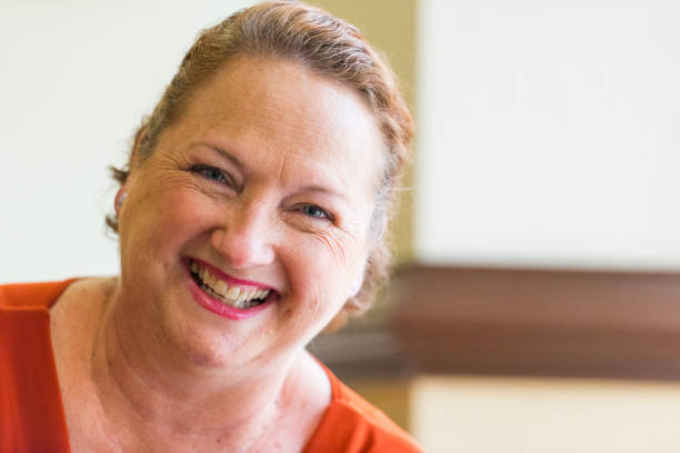 istock Smiling redhead mature woman 651017432