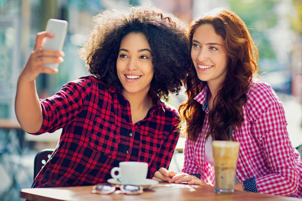 istock Girlfriends are taking selfie in the cafeteria 651045516