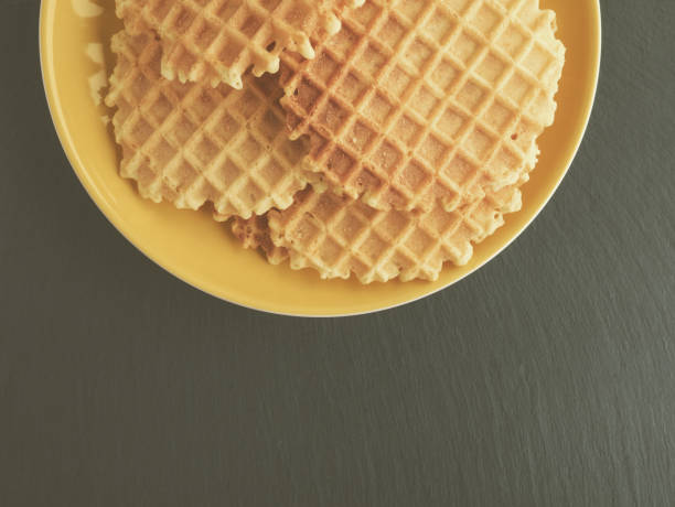istock Heap of sweet biscuit cookie pastry waffle. Room for text. 651053856