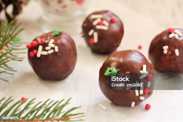 Christmas Cake Balls Covered In Chocolate Ganache Selective Focus Stock Photo - Download Image Now