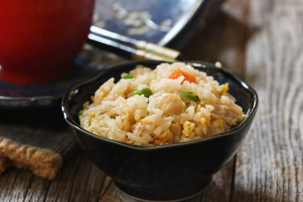 istock Chinese Fried rice served in s bowl, selective focus 651097192