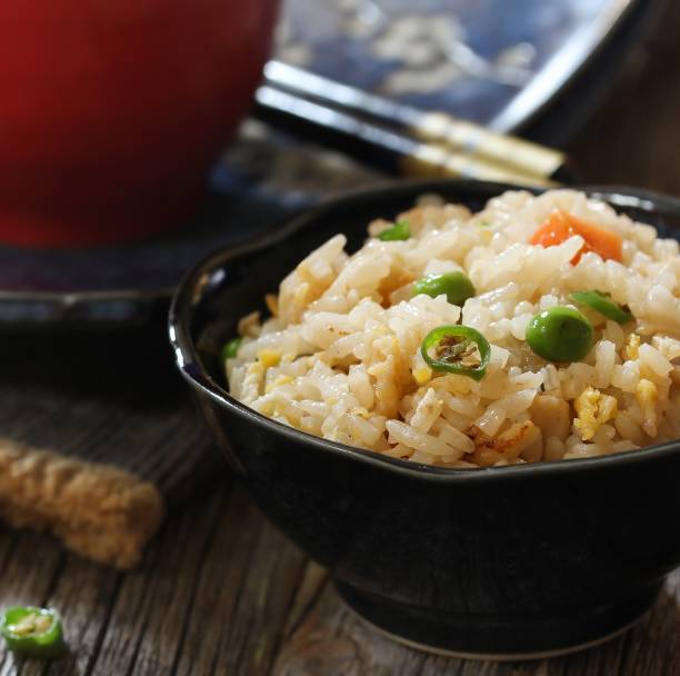 istock Chinese Fried rice served in s bowl, selective focus 651097212