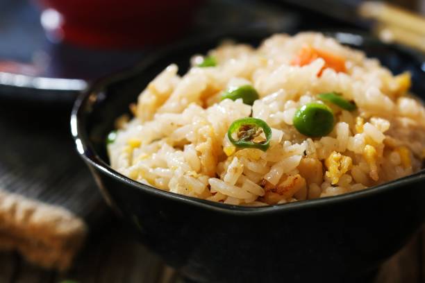 istock Chinese Fried rice served in s bowl, selective focus 651097226