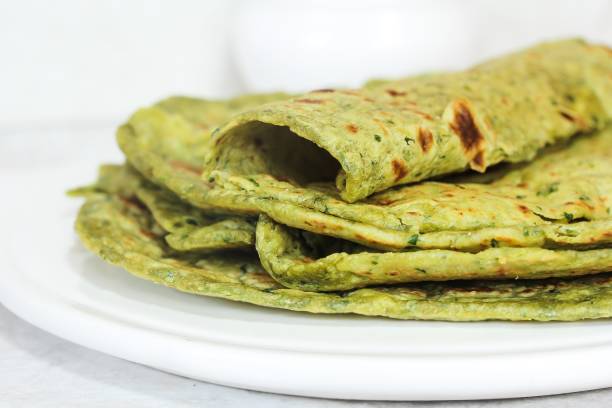 istock Methi Paratha (Thepla) / Indian flat bread using fenugreek leaves, selective focus 651138494