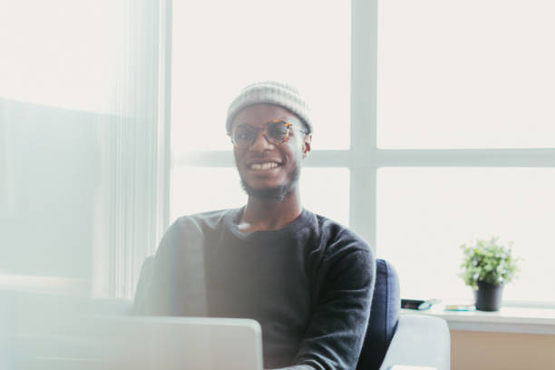 istock African american man working on a laptop. 651143206