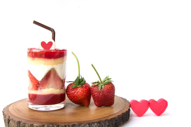 Strawberry cake in the glass isolated on white background