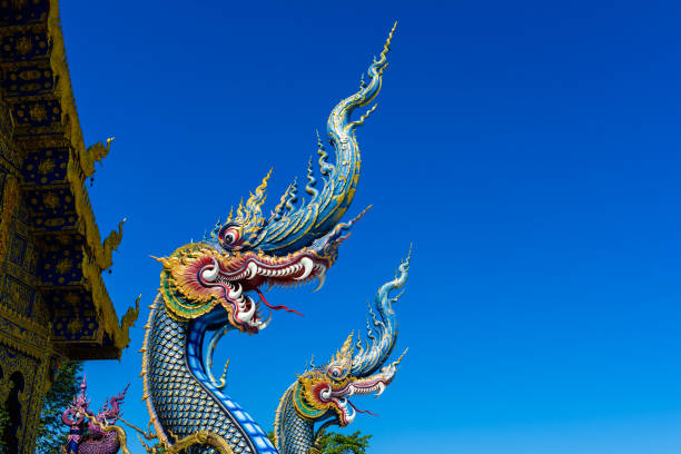 Naga statue in front of the Buddhist Temple  \