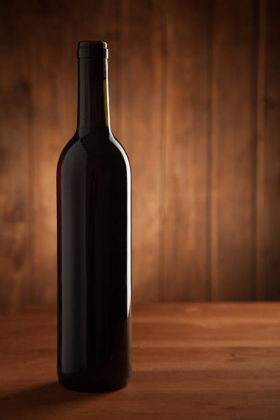 bottle of wine on an old wooden table
