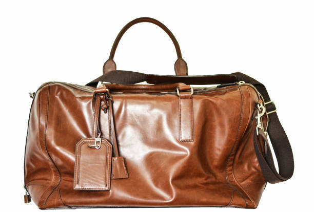 Travel leather bag isolated on white