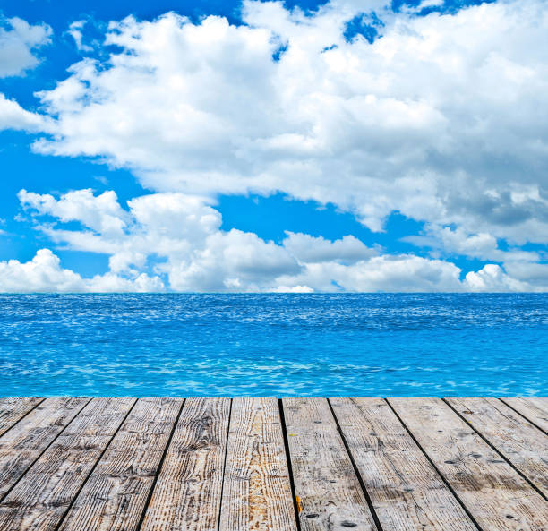 istock Tropical sea and wooden floor background 651199298