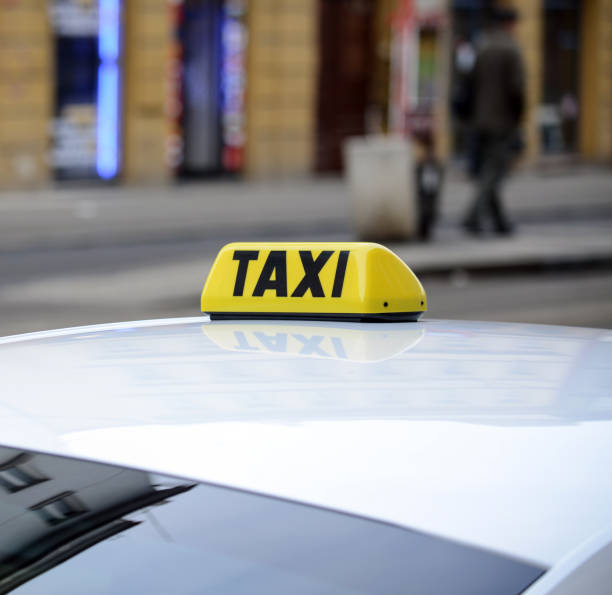 istock Taxi sign on car 651201862