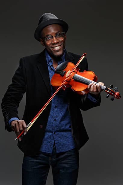istock The black man happy expression and music instrument 651202858